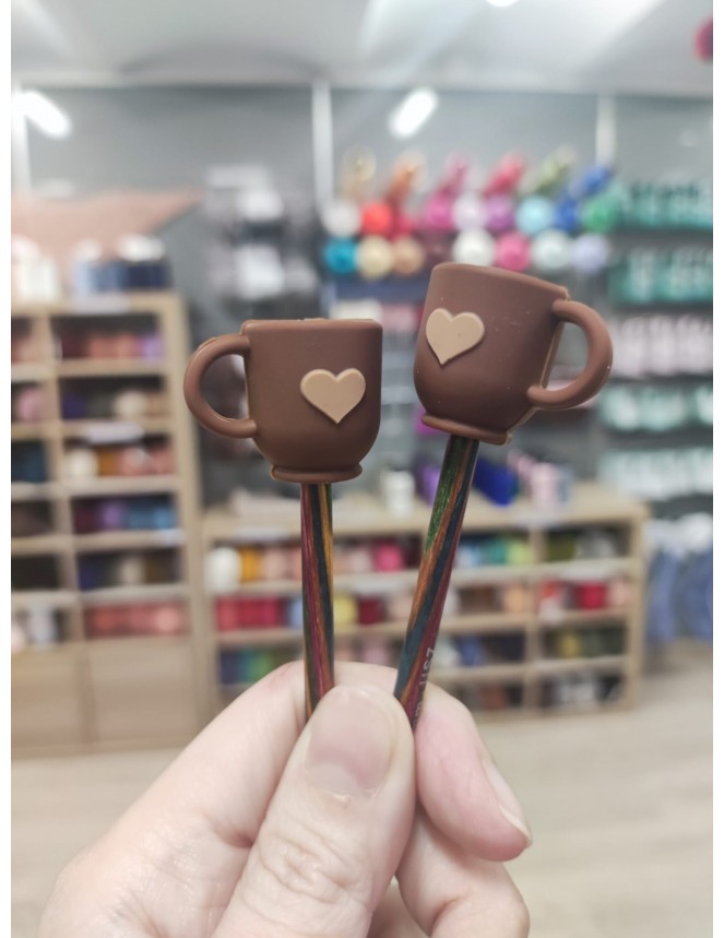 Protector agujas taza